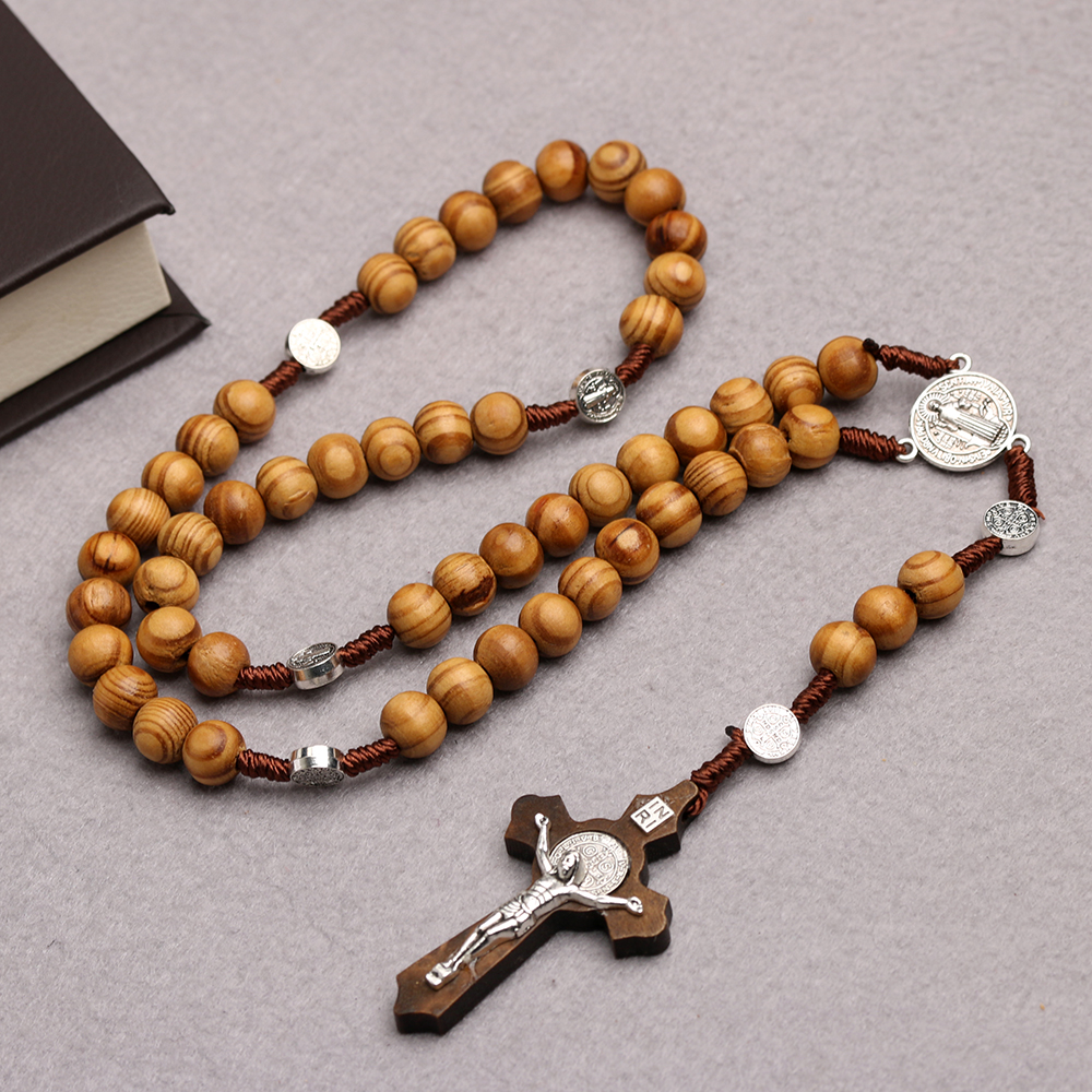 Natural wooden rosary ornaments in Christianity