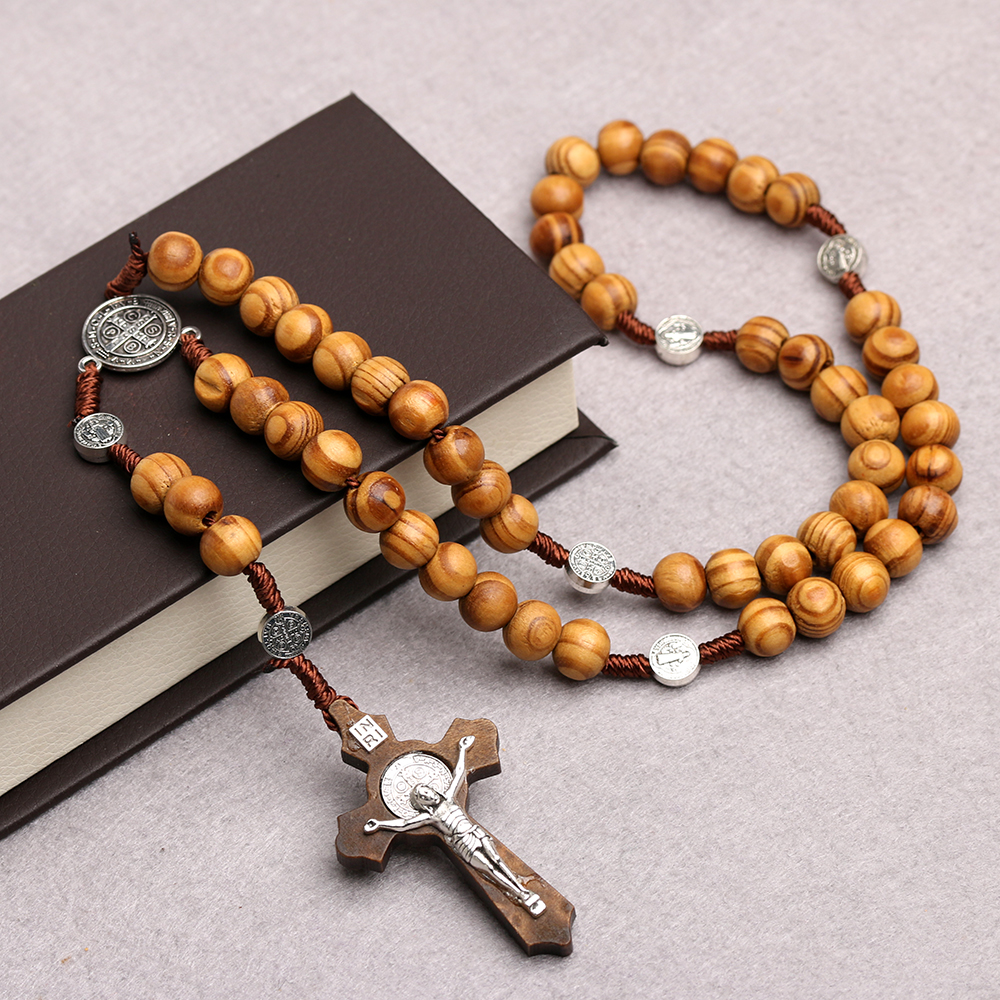 Natural wooden rosary ornaments in Christianity