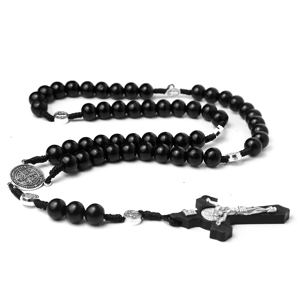 Natural wooden rosary ornaments in Christianity
