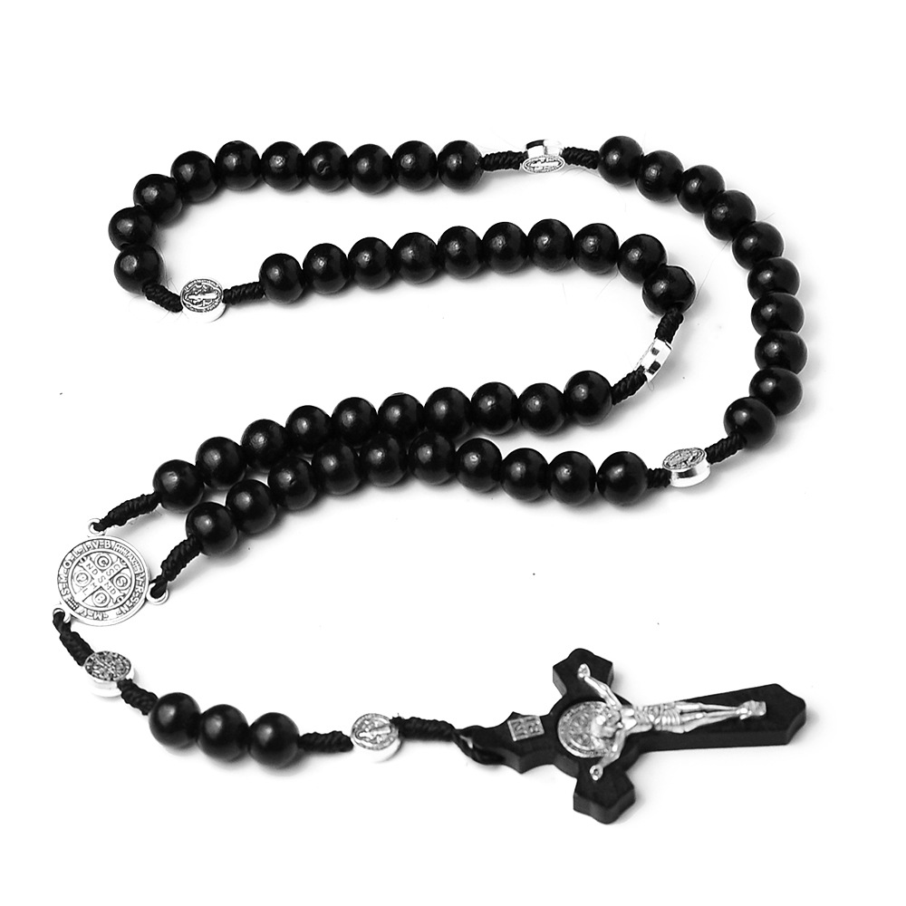 Natural wooden rosary ornaments in Christianity